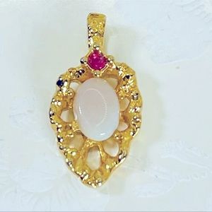 SOLD.  STUNNING VINTAGE PENDANT 10k GOLD WITH OPAL AND RUBY STONES